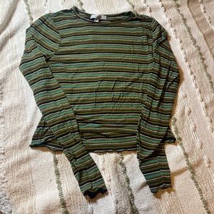 Gaze multi colored tight fitted shirt.